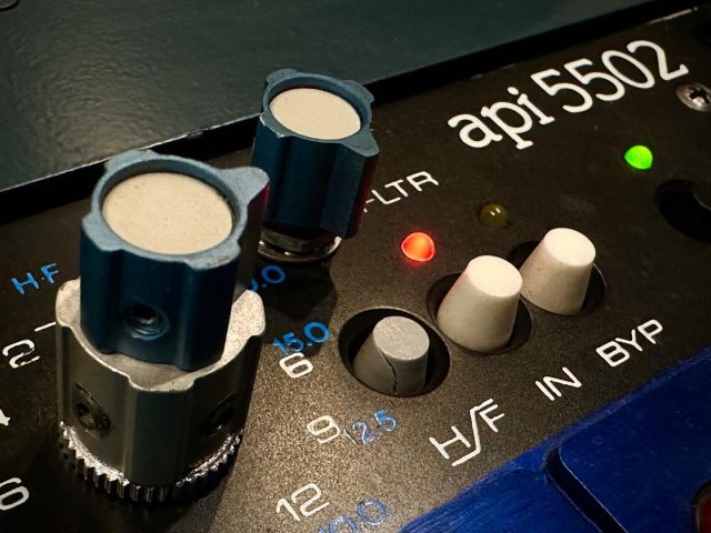 Some gear really does feel kinda magical.  Here’s a peek at the high-band (and the former location of the filter switch) on our modified API 5502.  Originally, the 5502 was made by Paul Wolff, and as I remember him telling me, he started from the 550A schematic, to model the idea of a 4-band 550A with more frequency options.  Like the 550A, there are two 2520s per channel.  One of the ‘magic’ things about this design is a happy-accident in the implementation of the shelving mode, which resulted in unusually broad, smooth slopes. 

As for the modifications,  well, in place of the filter switches this unit has been modified (by the amazing Frank Lacy) to add a three-position Grayhill rotary switch that toggles the overall range of the gain controls among three options: the original 2dB, 1dB or 0.5dB per step. 

We’ve also loaded this with Liebers Red Dot op-amps, which I think sound amazing in this box, and make it more well-suited as a mastering processor. 

Love this thing.  It doesn’t get used on every project, but when it does get used, it’s so, so good.